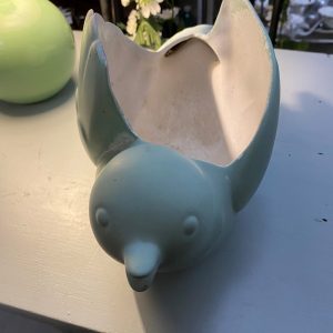 Cache pot oiseau
