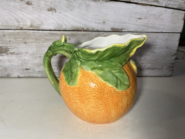 Pichet en barbotine orange